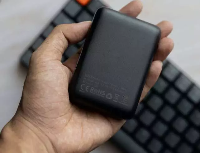 New Power Bank Holding In The Hand