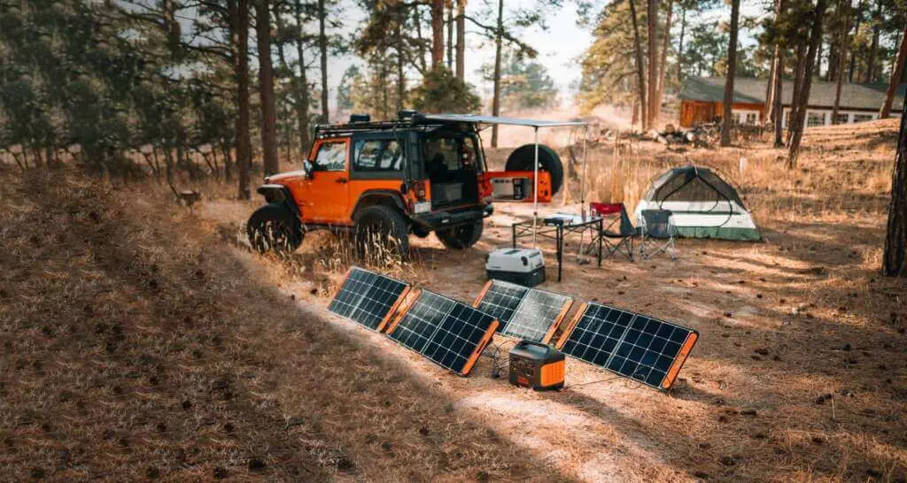 Jackery Power Station Charging Vis Solar Panel In Forest Jackery Power Station Charging Vis Solar Panel In Forest