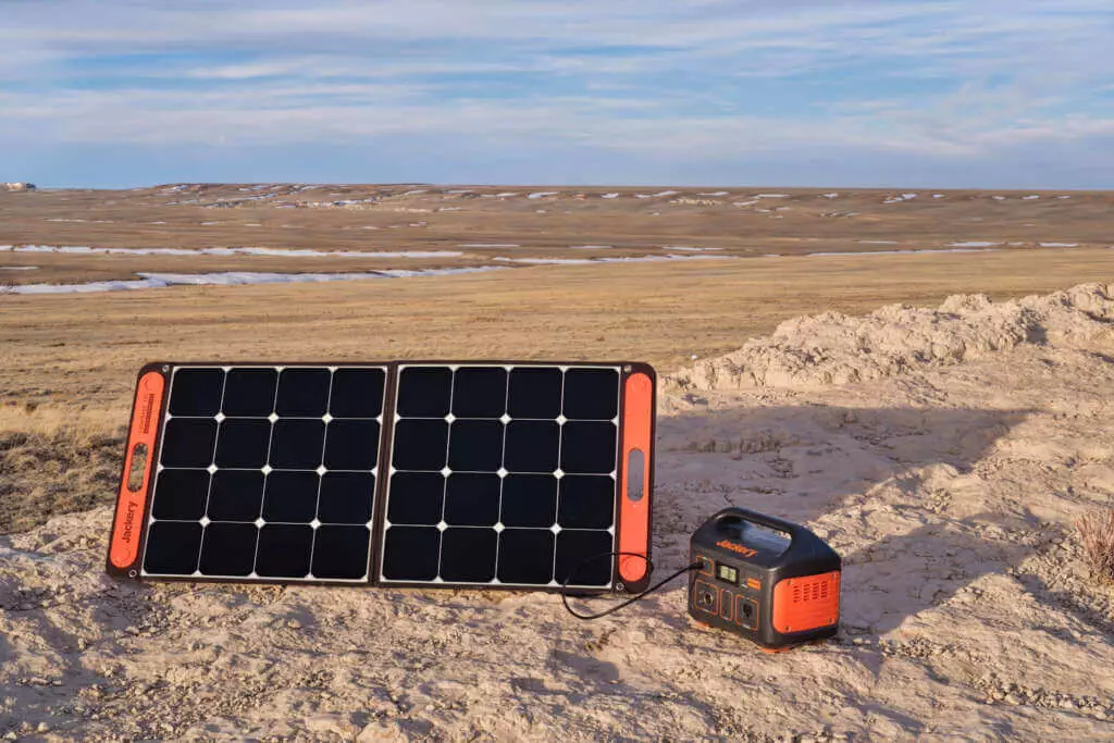 Solar Panel Charging Portable Power Station In Camping